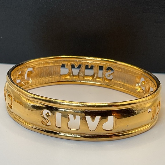 CHANEL Gold Cut Out Logo Bangle - Picture 6 of 10
